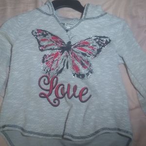 A shirt with a hoodie